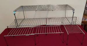 lot 2068 image: 4 Wire Shelves - 3 Adjustable - 1, 16 to 24 L x 10W - 1, 19 to 33 L x 8.5 W - 1, 13to 21 L x 6 W - 1, 6x11 not adjustable