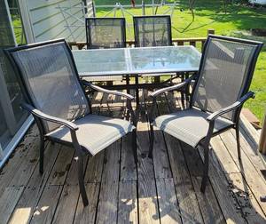 lot 502 image: Metal and Glass Top Patio Table 66 x 40 and 4 Chairs
