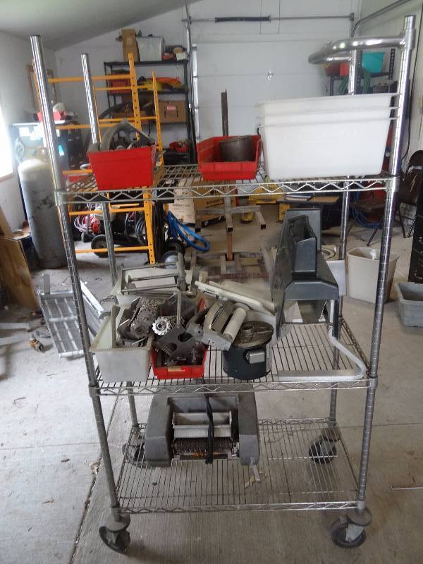 lot 356 image: Large Lot Of Hobart Meat Tenderizer Parts On Metro Rack With Casters
