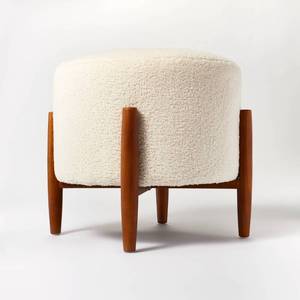 lot 5511 image: Elroy Faux Shearling Round Ottoman with Wood Legs Cream