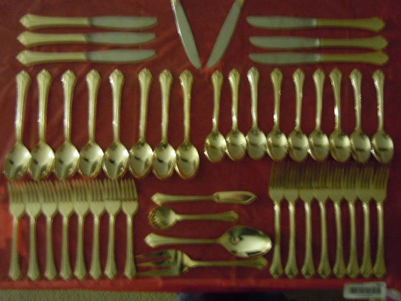 lot 551 image: Lot of Gold Silverware