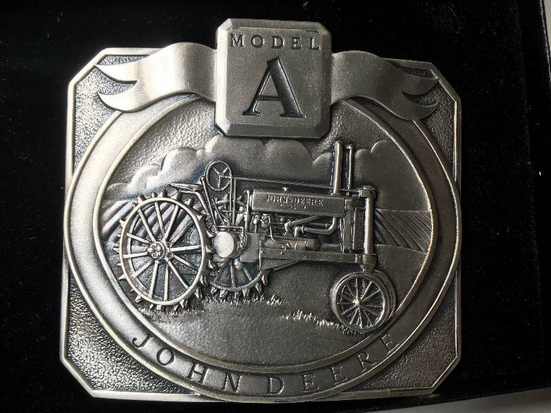 lot 6069 image: John Deere Belt Buckle