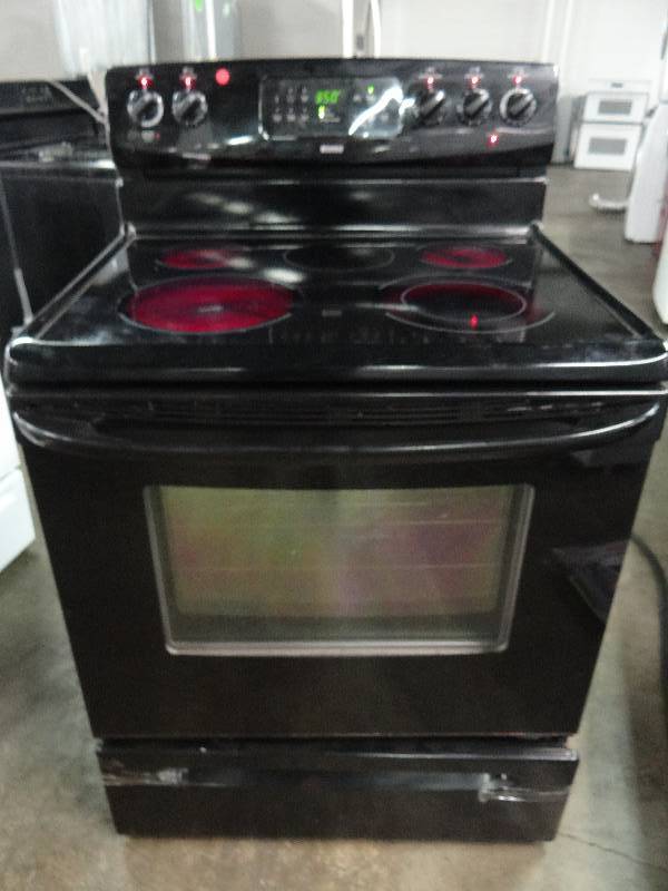 lot 8401 image: Kenmore Electric 4 Burner Household Stove w Warmer