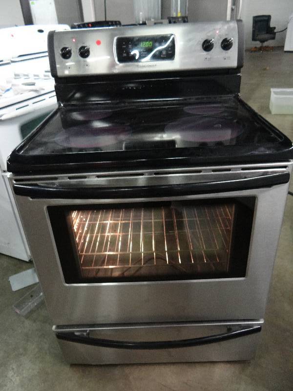 lot 8402 image: Frigidaire Electric 4 Burner Household Stove