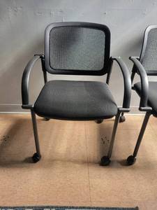 lot 15570 image: Black Armed Rolling Chair W Mesh Back
