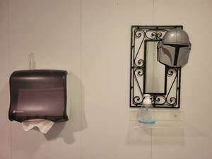 lot 15594 image: San Jamar Towel Dispenser and a Small Decorative Black Mirror