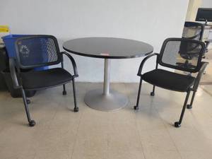 lot 15606 image: 41in Dark Brown Wood Laminate Table W 2 Black Rolling Chairs