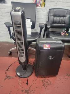 lot 15702 image: Holmes Tower Fan and an Amazon Basics Paper Shredder&nbsp