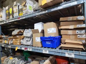 lot 47039 image: Contents of Shelf Including Unirac, VS- Splice Connectors, L- Mounts, and More