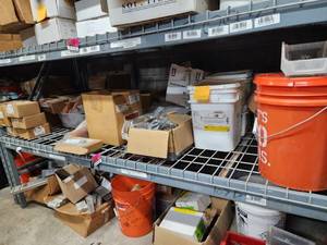 lot 47044 image: Contents of Shelf Including Everest Dome Brackets, Dyno Raxx DynoBond, Installation Fasteners, And More