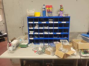 lot 15713 image: Contents of Table - 40 Compartment Hardware Organizer, Assortemnt of Hardware, Drill Bits, and More