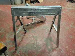 lot 15723 image: Lot of 2 Foldable Galvanized Steel Saw Horses&nbsp