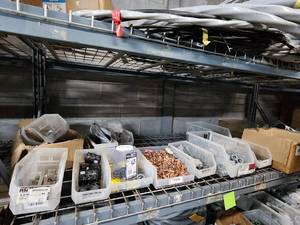 lot 47051 image: Contents of Shelf Including, Couplings, Flex Conn, Bushings, and More