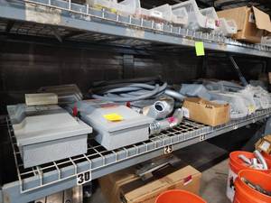 lot 47052 image: Contents of Shelf Including, Siemens Disconnects, Flexible Conduit, Couplings, and More