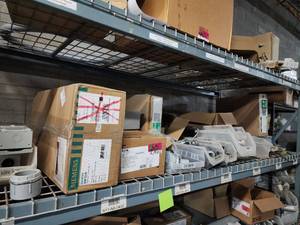 lot 47055 image: Contents of Shelf Including, Siemens Main Breakers, Eaton Safety Switch, Couplings, and More