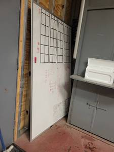 lot 15737 image: 6ft Whiteboard and a 4ft Gray Laminate Table