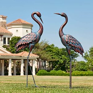lot 1913 image: Kircust Garden Crane Statues Patina Heron Decoy, Standing Metal Crane Sculptures Bird Yard Art for Outdoor Decor, Set of 2