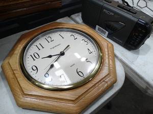 lot 33411 image: Wall Clock and Portable Radio