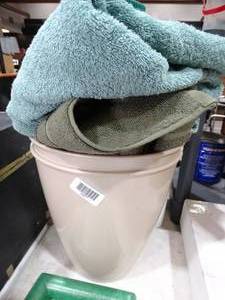 lot 33477 image: 2 Tan Trash Cans w Bath Towels