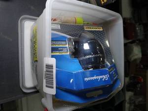 lot 33556 image: Small Bucket of New Fishing Gear  Lures and Shakespeare Reel