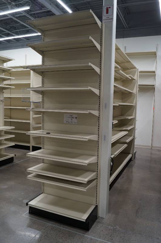 lot 7002 image: 1 Lozier Brand (The Cadillac of shelving) Gondola Unit with shelving as pictured