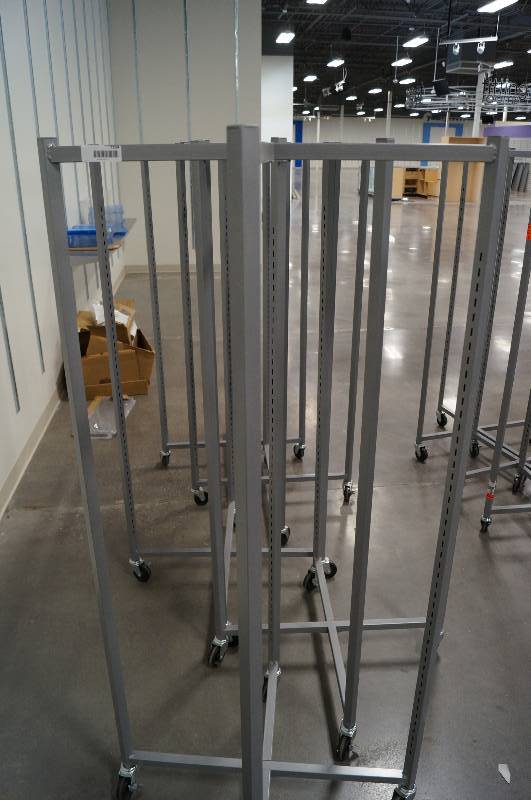 lot 7104 image: 5 rolling display racks
