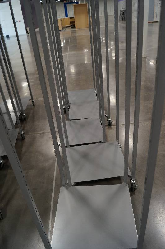 lot 7115 image: 5 Rolling Display Racks