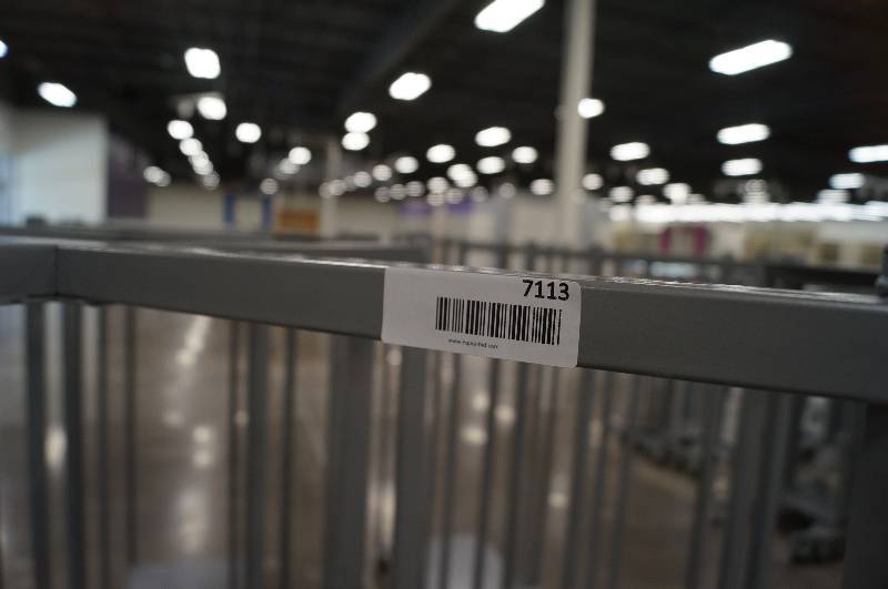 lot 7113 image: 5 rolling display racks with square base