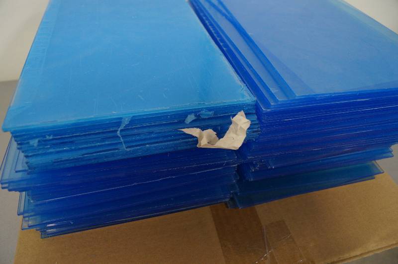 lot 7145 image: Plexi glass - new and pile of misc sign info