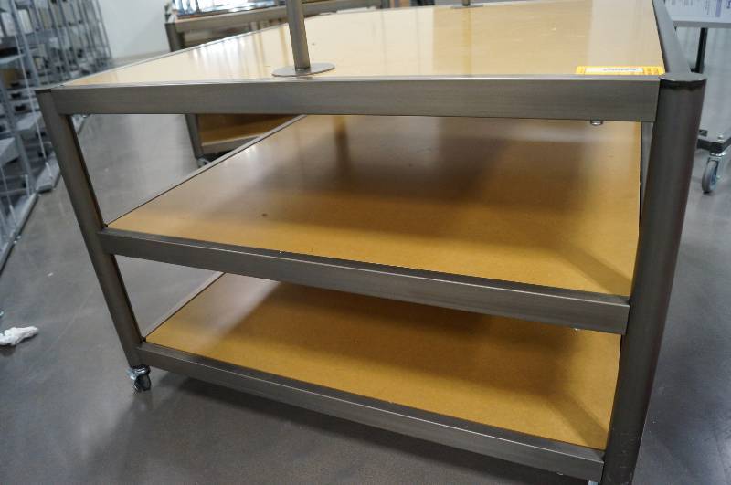 lot 7055 image: Rolling Jean Display Rack