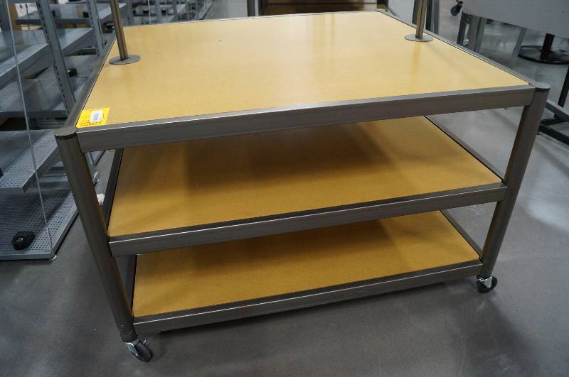 lot 7056 image: Rolling Jean Display Rack