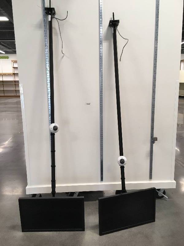 lot 2029 image: 2 Axis Security Cameras and TVs with long ceiling mounts.