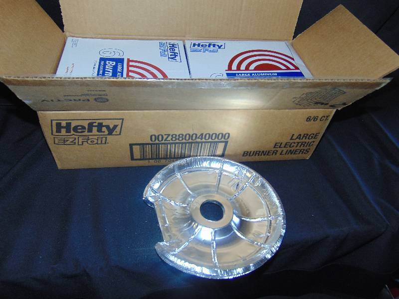 lot 7069 image: (1) case Hefty large burner liners for electric stoves, 66 ct boxes- 36 liners total