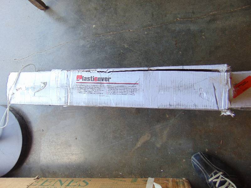 lot 7205 image: (1) roll plastic cover, self adhesive clear plastic for carpet protection