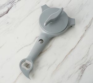 lot 56205 image: Retail - $22.00 Kuhn Rikon 5-in-1 Jar & Bottle Opener, Red