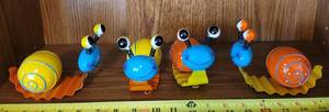 lot 345 image: (4) Metal snails garden decors