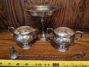 lot 148 image: Sterling Sugar & Creamer Set  Sterling Candle Snuffer  Weighted Sterling Compote