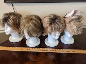 lot 172 image: (4) Wigs W Styrofoam Heads
