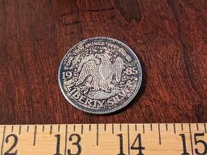 lot 187 image: 1985 One Troy Ounce Liberty Silver Coin