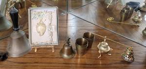 lot 371 image: (3) Metal bells  candle snuffer & brass shot glass