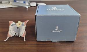 lot 415 image: A moments rest butterfly figurine Lladro