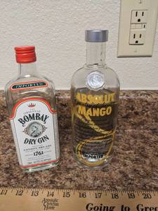 lot 258 image: Bombay Gin & Absolut Mango Bottles
