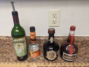 lot 261 image: Grand Marnier - Cabo Wabo - Triple Sec & Regusci Bottles