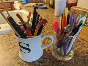 lot 288 image: Various Pens In Mugs