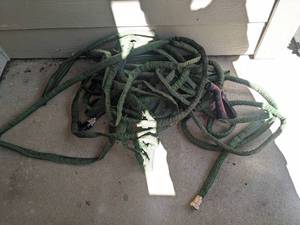 lot 302 image: Garden Hose & Sprayer
