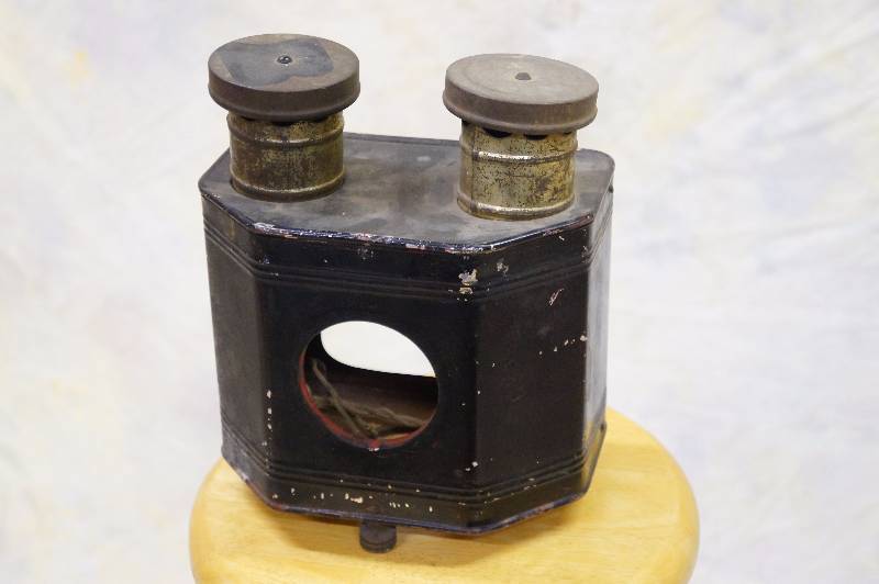 lot 12 image: Part of an antique lantern slide projector.