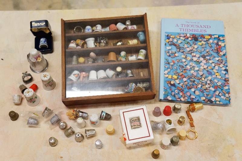 lot 32 image: Thimbles & book.