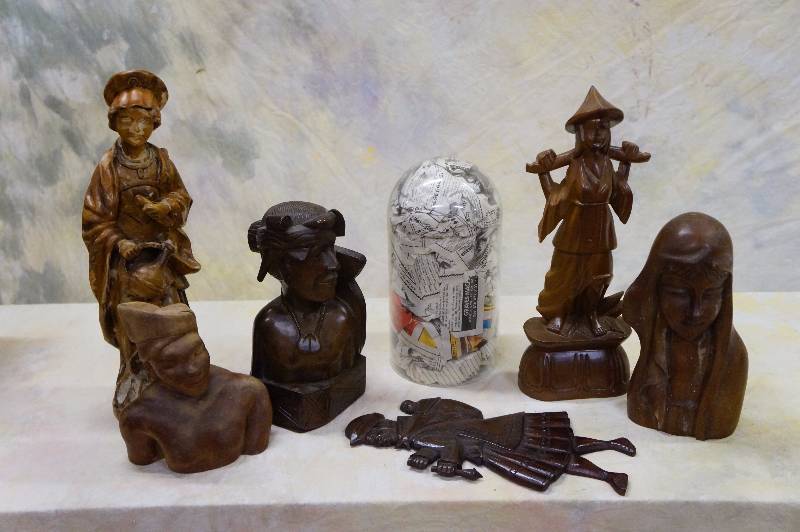 lot 41 image: Exotic carving & glass for a clock.