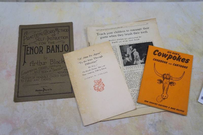 lot 48 image: 4 - old soft bound books.