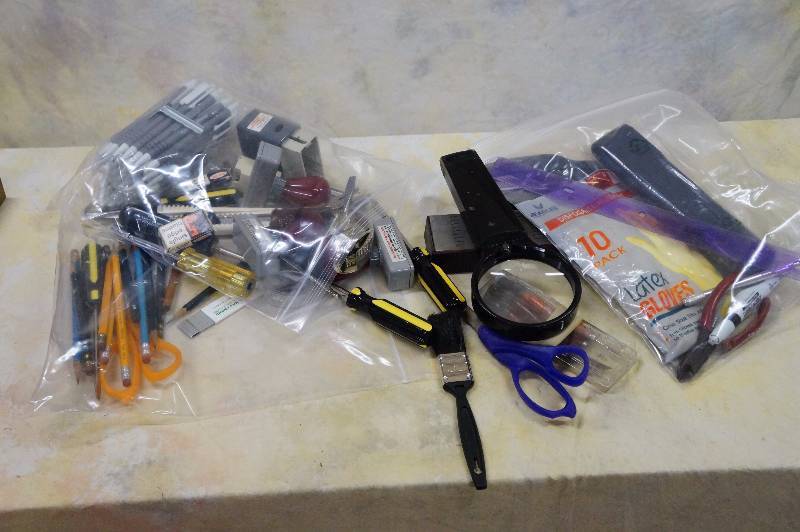 lot 79 image: Misc lot of office supplies & tools three bags.